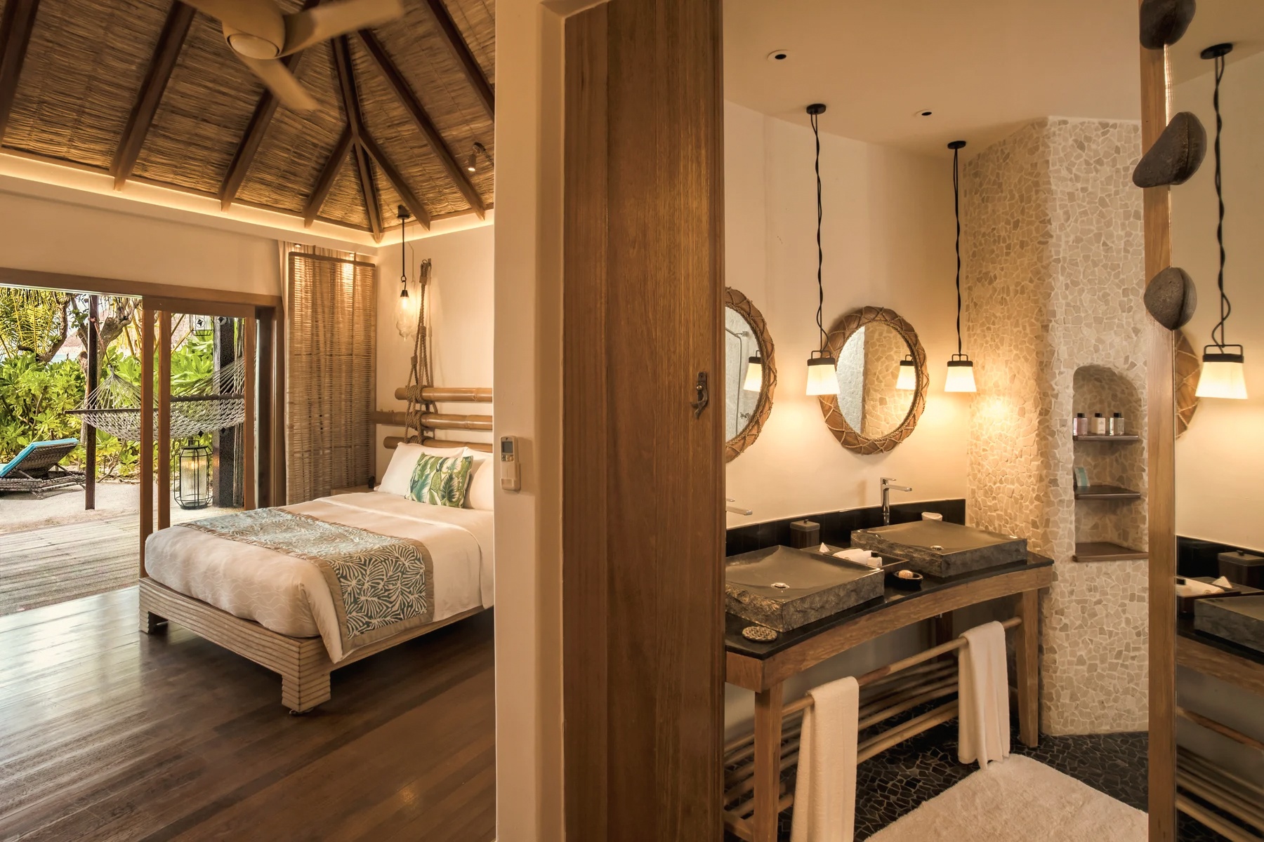 The interior of a beach villa. Generous proportions, direct beach access, and the kind of finish that makes the all-inclusive rate feel like the right frame.