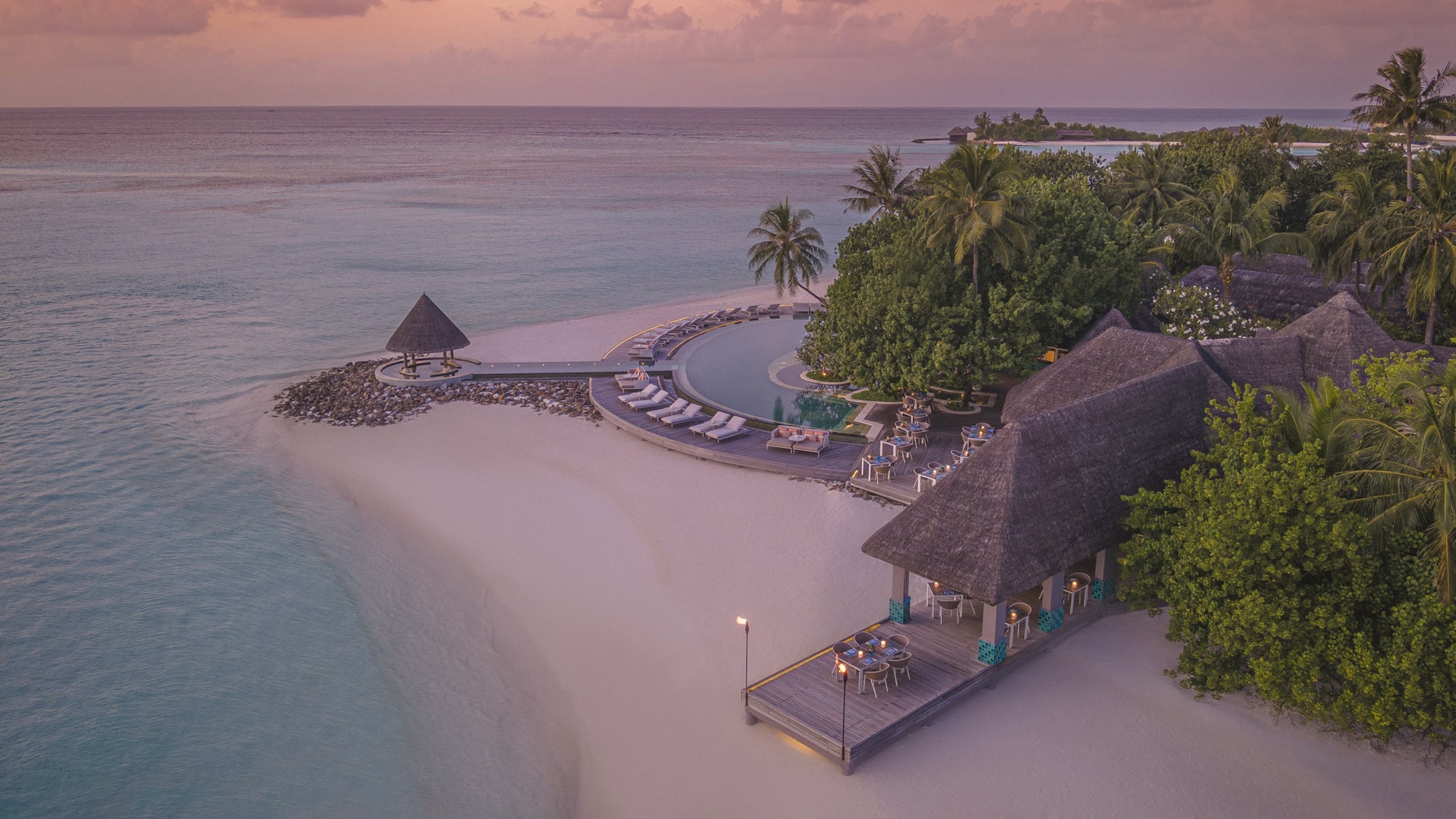 Reef Club. The property's main restaurant venue, set on the lagoon-facing shoreline.