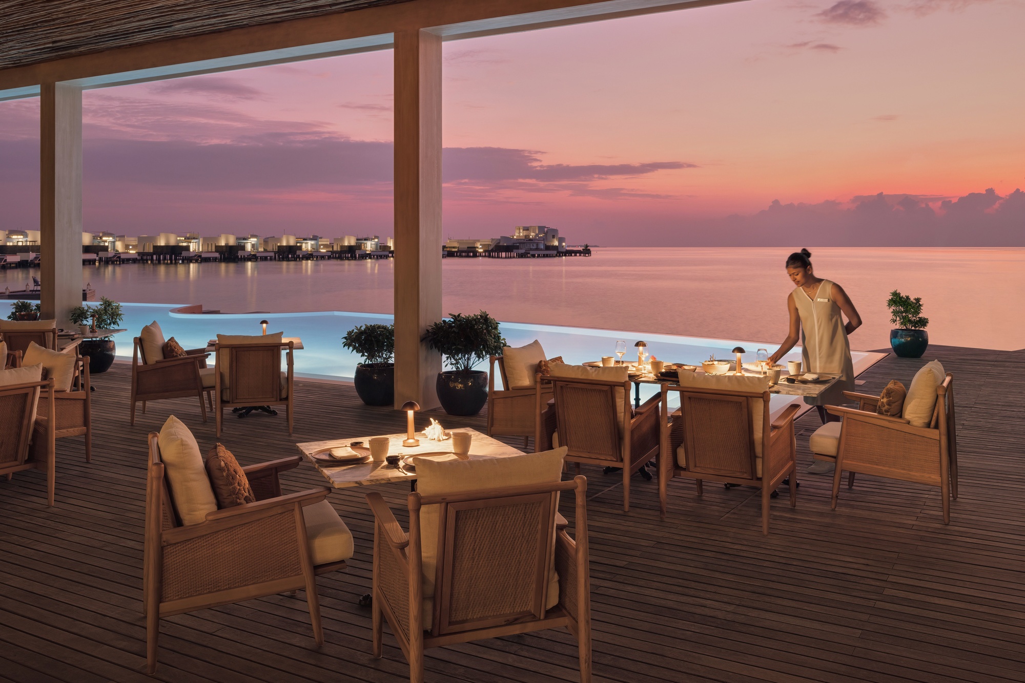 The main dining venue at Jumeirah Maldives. Mediterranean-influenced interiors, open to the ocean on the prevailing side.