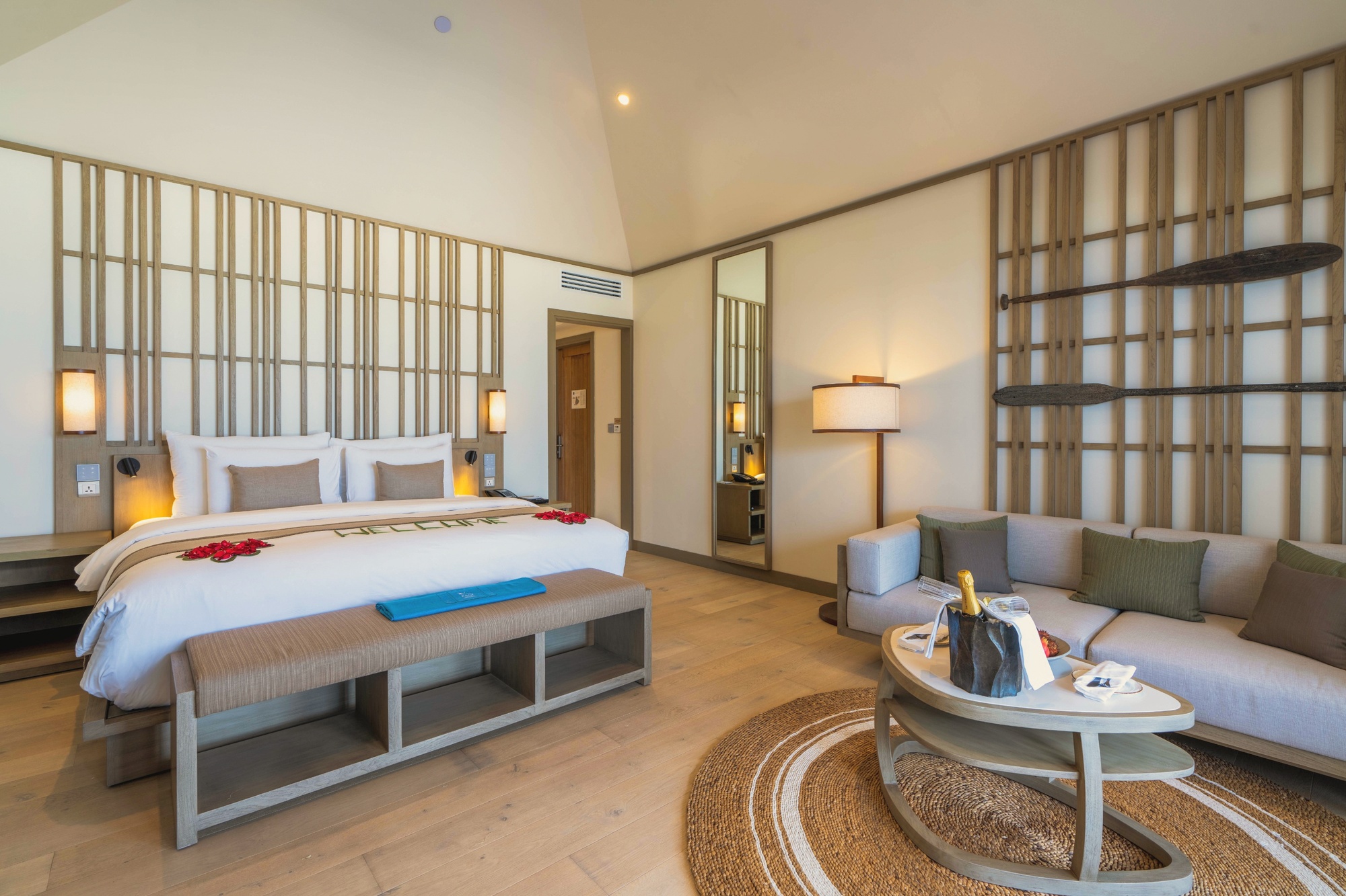 Beach villa interior. Kagi's residential vocabulary, restrained and wellness-positioned in tone.