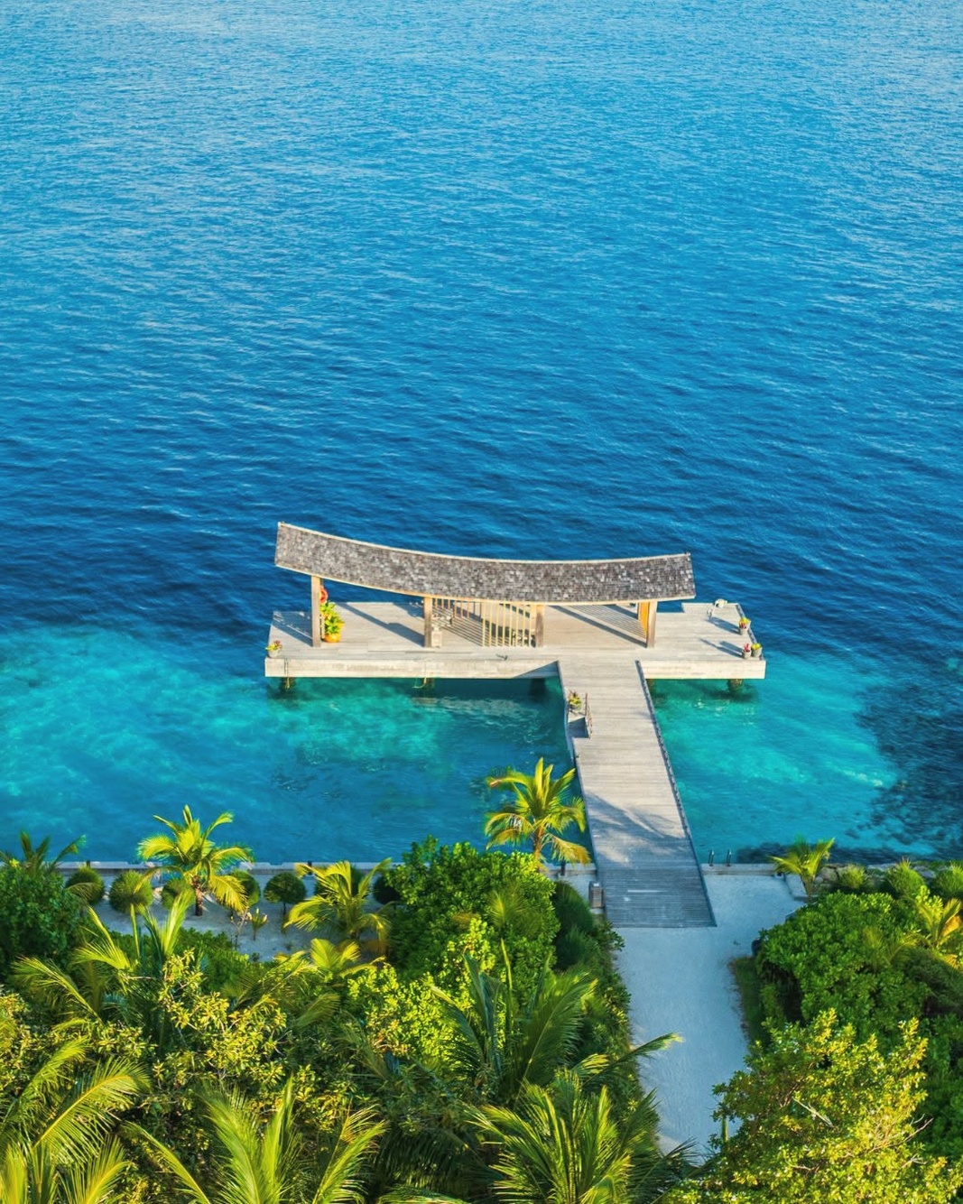 Yoga deck at sunrise. Kagi's wellness day starts with the morning practice on the western shoreline.
