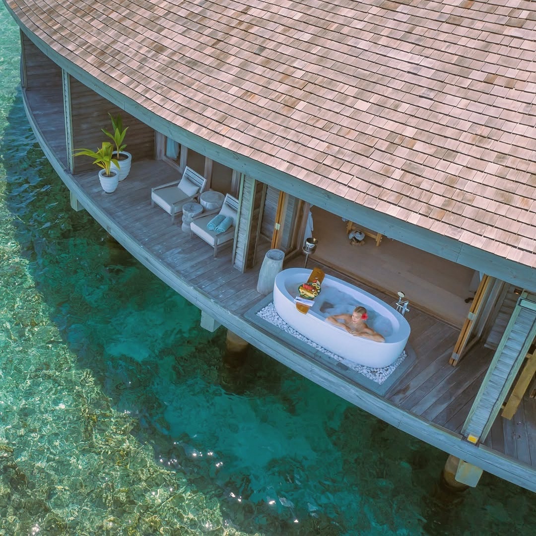 Ayurvedic treatment room. The property's traditional-wellness offering integrated with the contemporary programme.