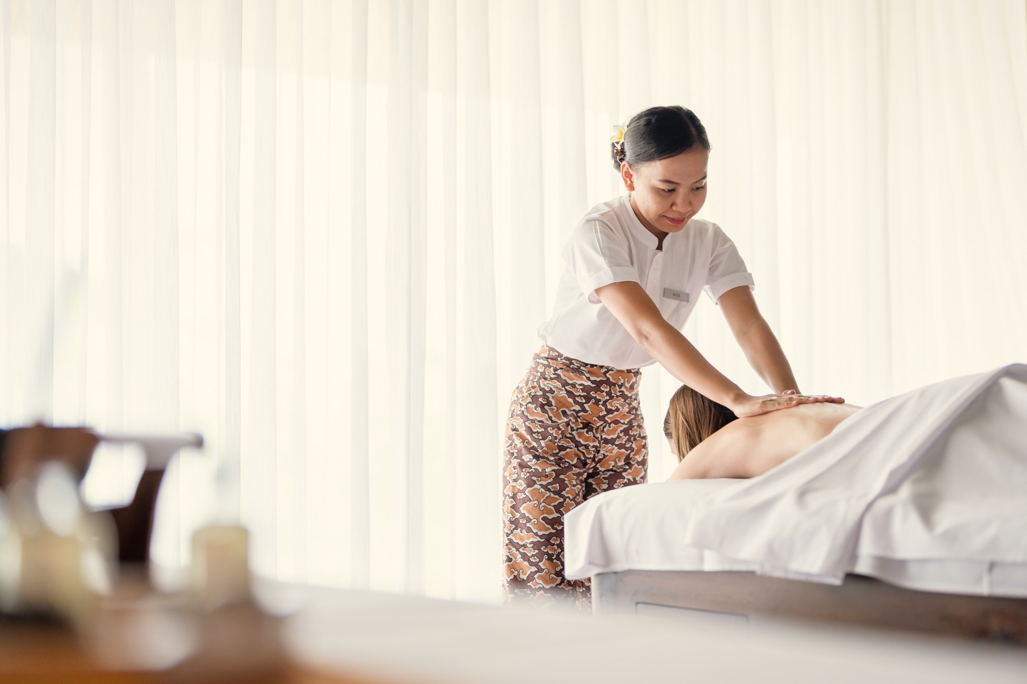The resort's wellness facilities. A calm interior, natural materials, and the sound of the lagoon outside.