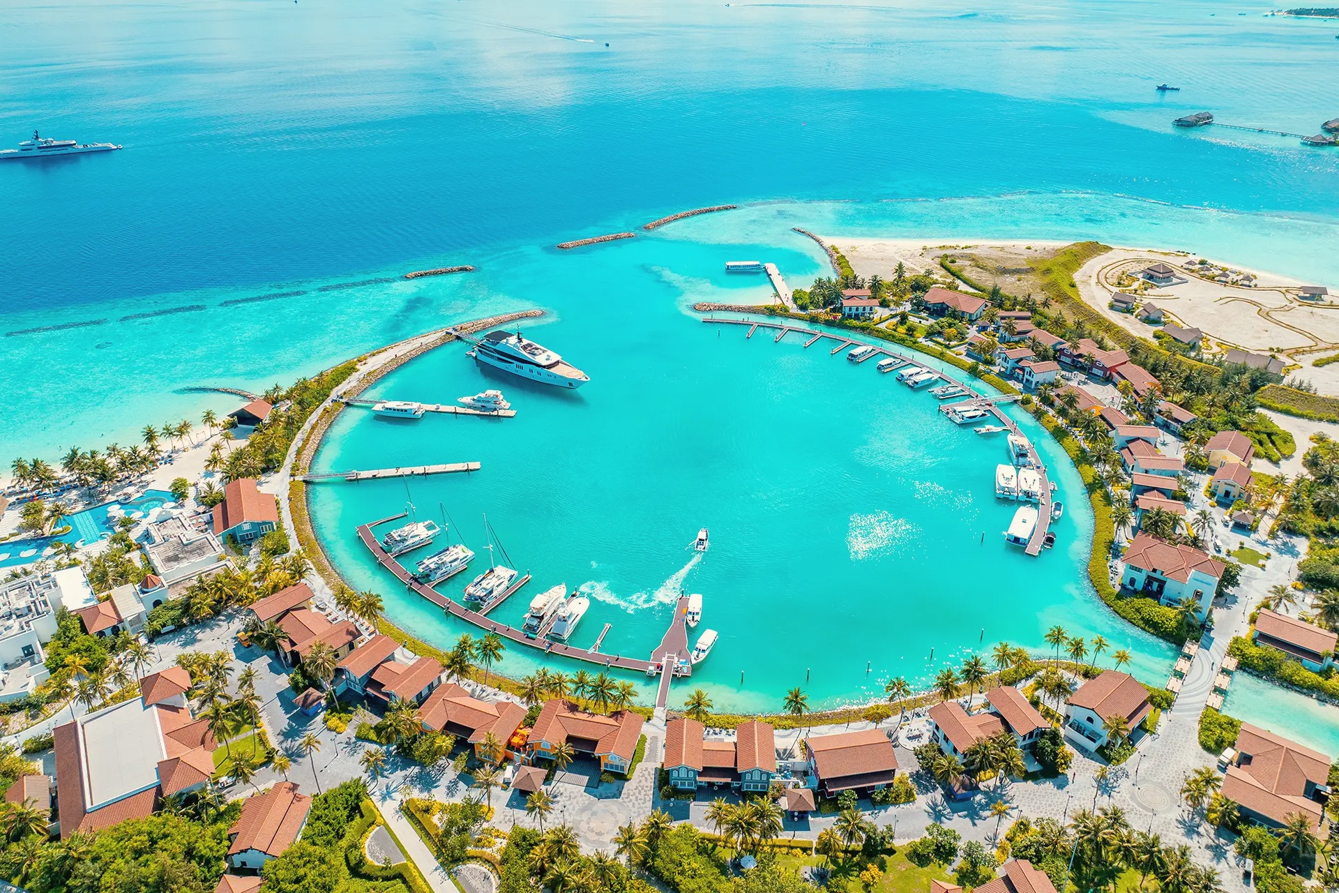 The Crossroads marina village. The shared platform between SAii Lagoon and Hard Rock Hotel Maldives, with additional dining and retail accessible to guests of both resorts.