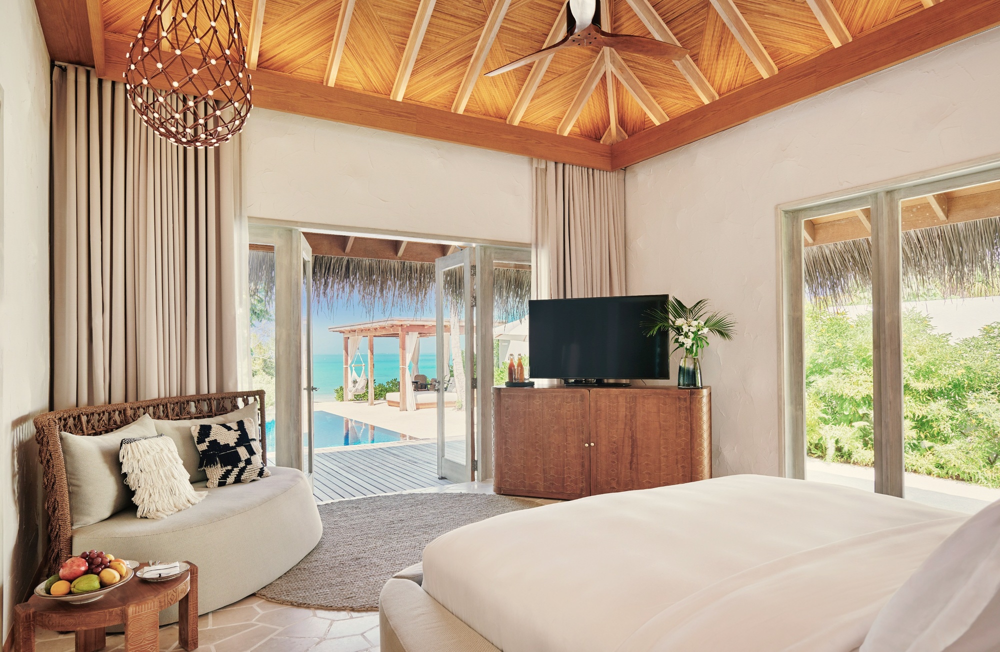 The interior of a Pool Sunset Beach Villa. Private pool, direct beach access, and the quality of light that a west-facing orientation produces at the end of the day.