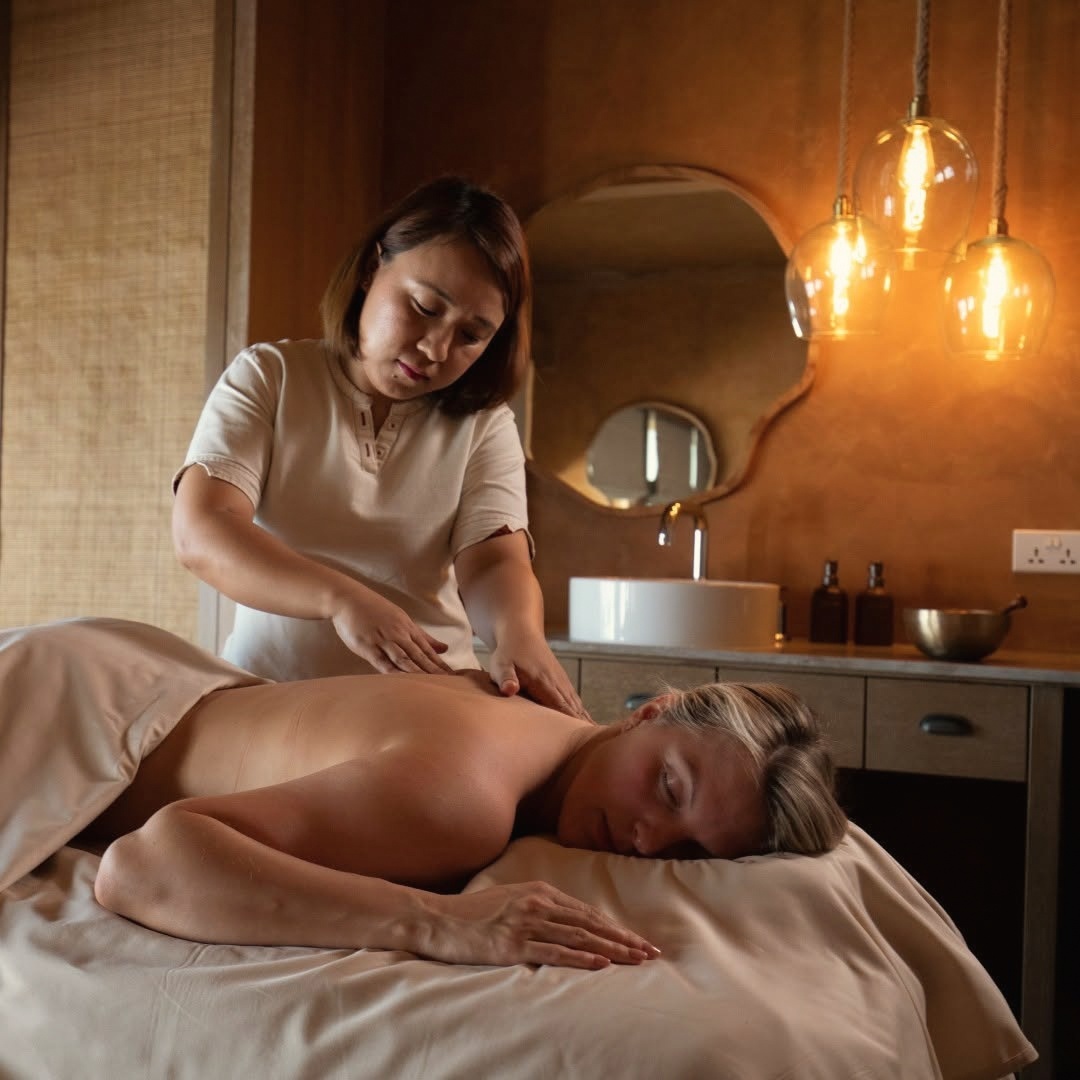 The Six Senses spa treatment room. The wellness programme is the operational centrepiece of the resort, with integrative health consultations and the Alchemy Bar.