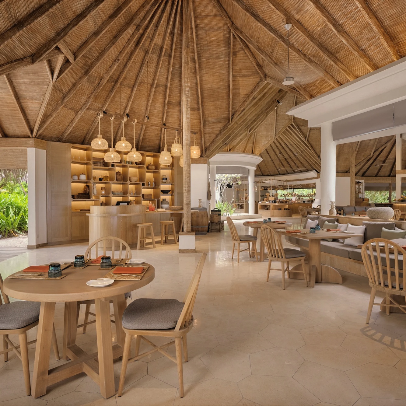 The main restaurant at Kanuhura. Open-sided, set close to the water, with a menu that covers the full meal-plan range.