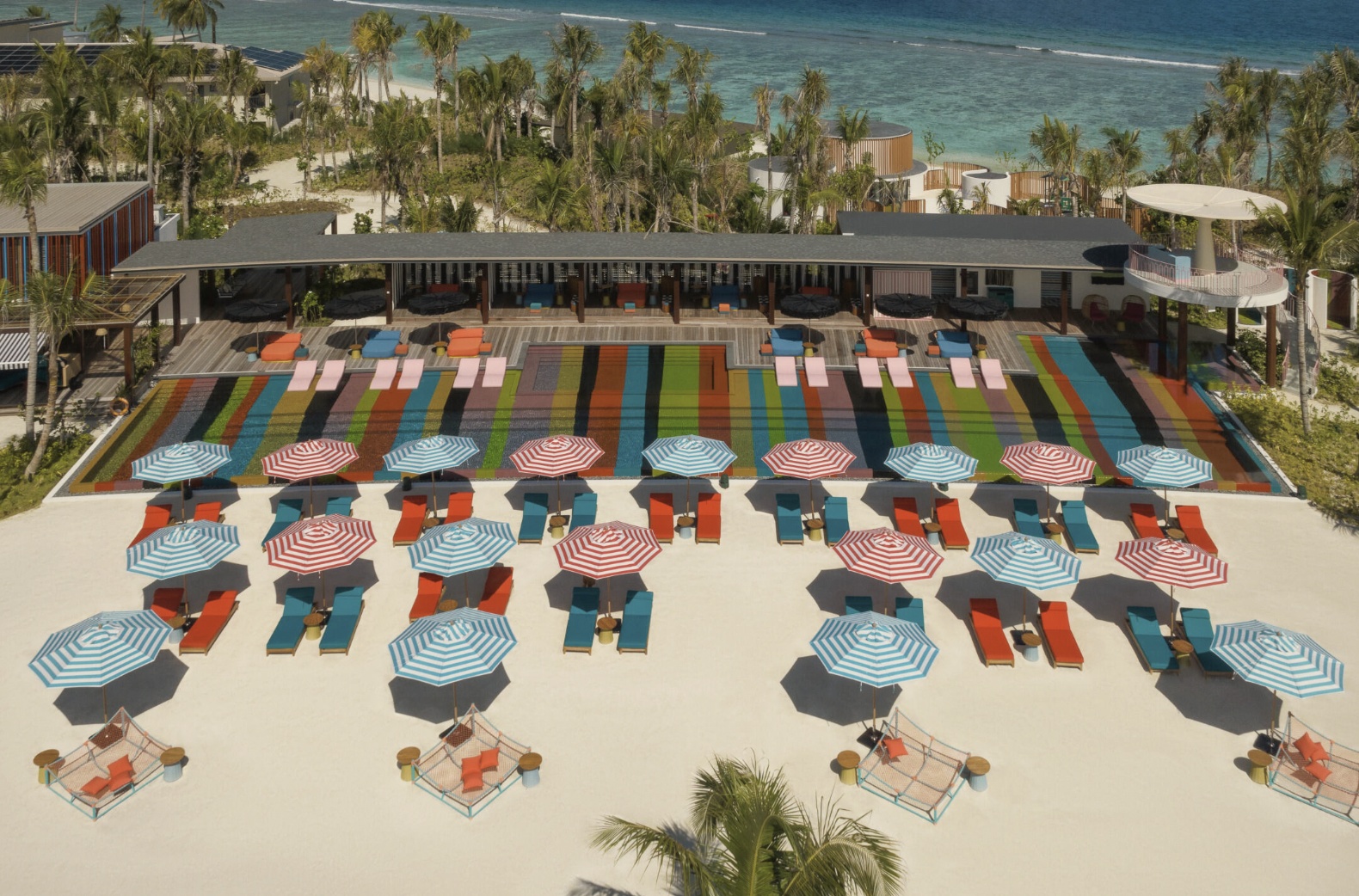 The beach club in operation. This is the social engine of the resort, and the reason SO/ Maldives suits guests who want energy as well as privacy.
