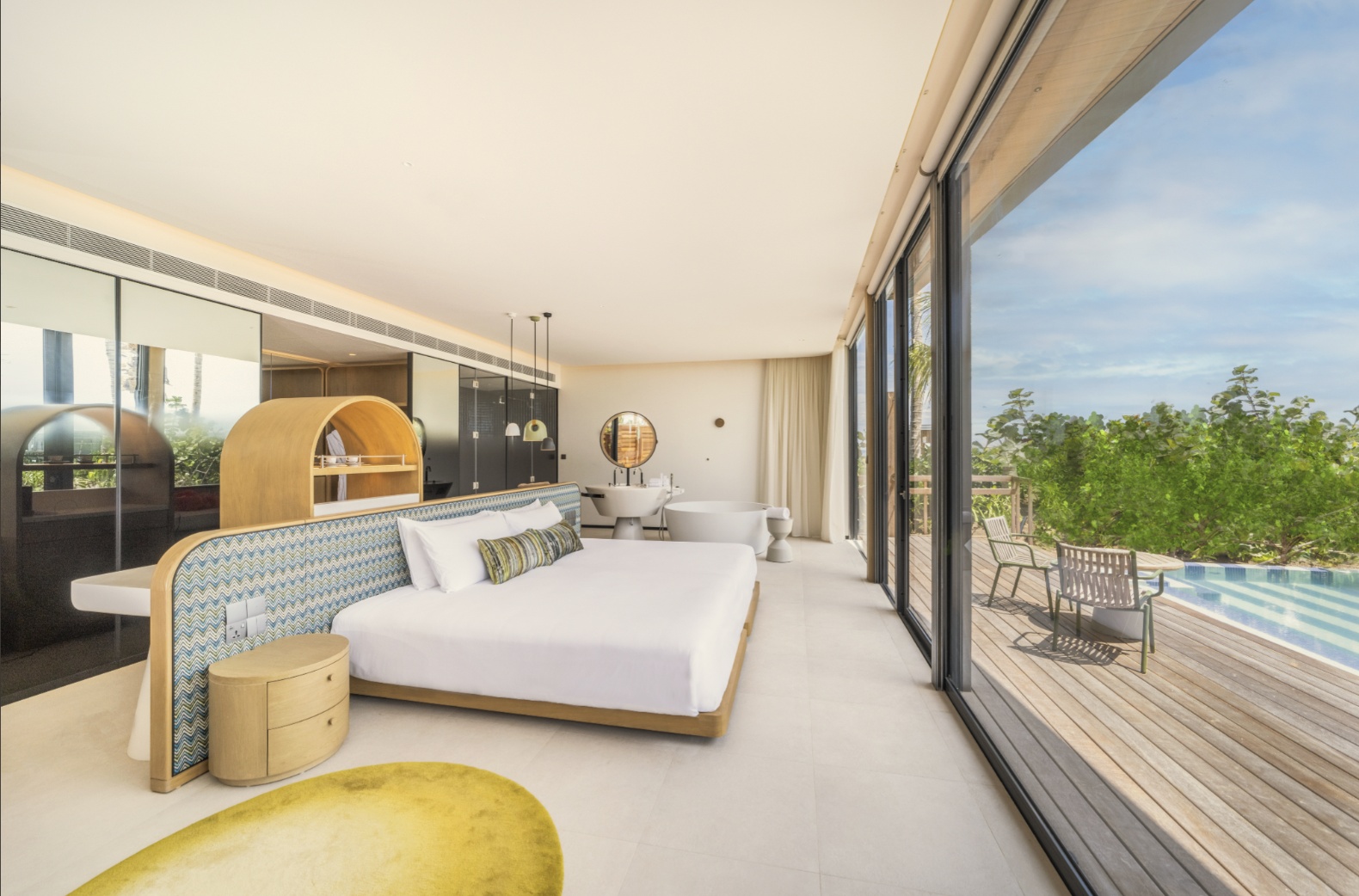 A beach villa interior. The SO/ design identity runs through the rooms: bold colour, considered furniture, nothing generic.