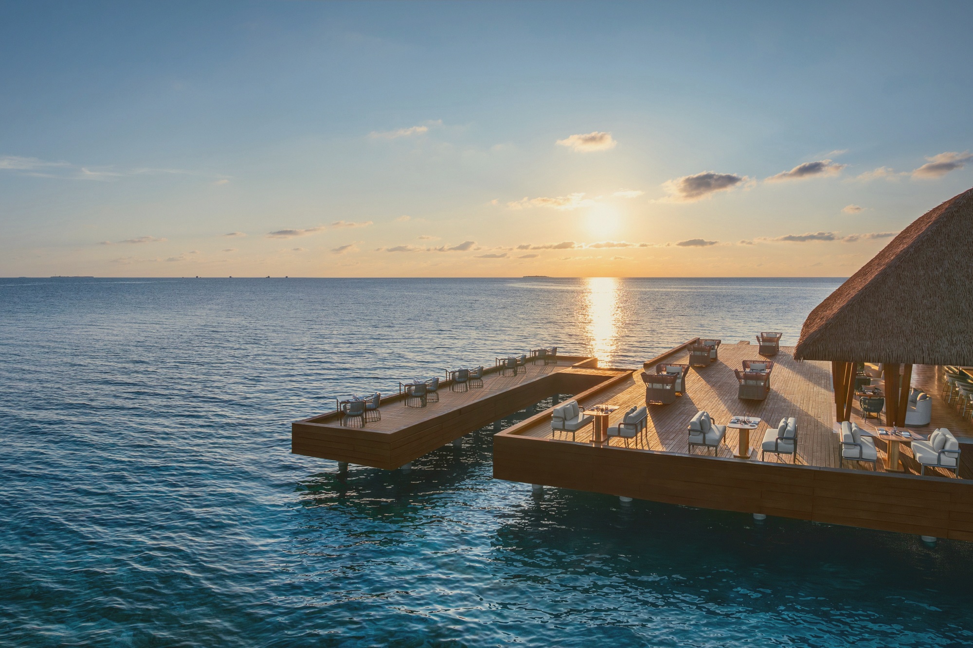 Fish. The over-water restaurant, the property's signature dining venue with the W brand vocabulary throughout.
