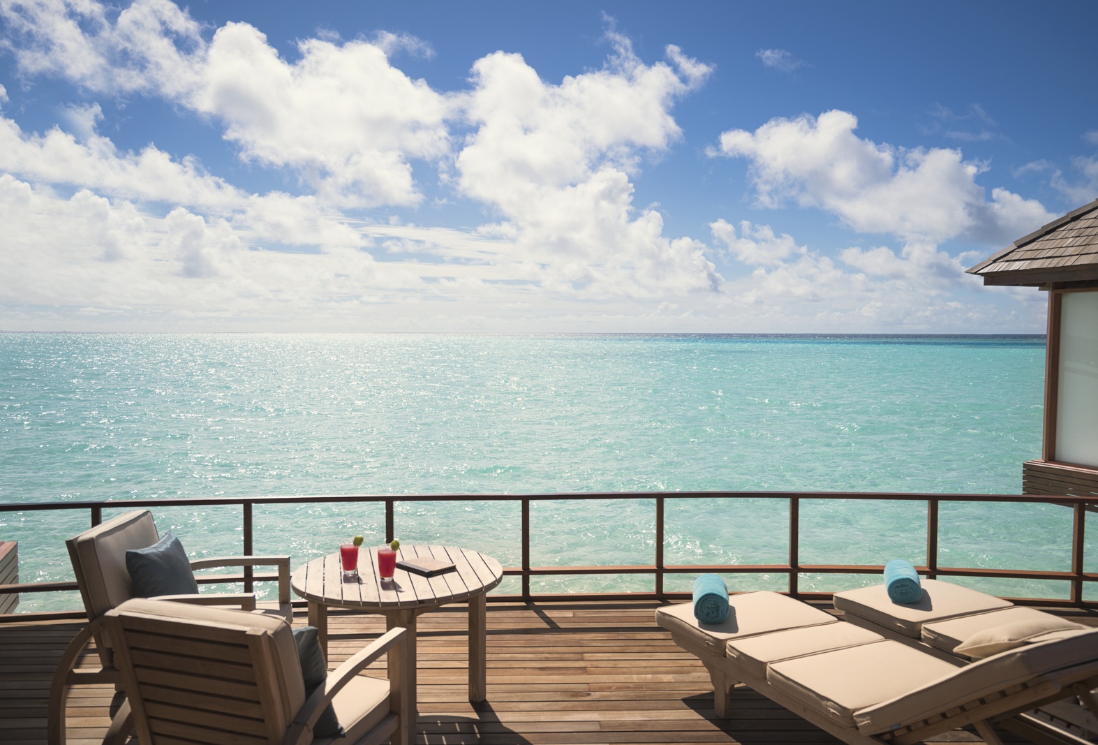 Sunset Over Water Suite. Anantara Dhigu Maldives Resort